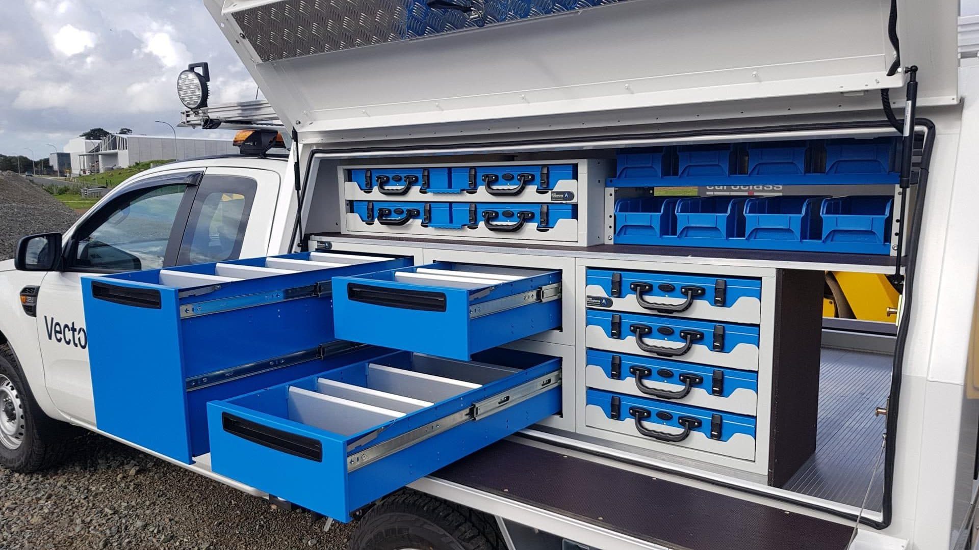Modular plastic drawers and shelving for ute service body